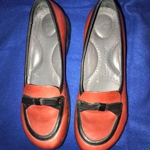 Gorgeous red Dansko flats with black trim